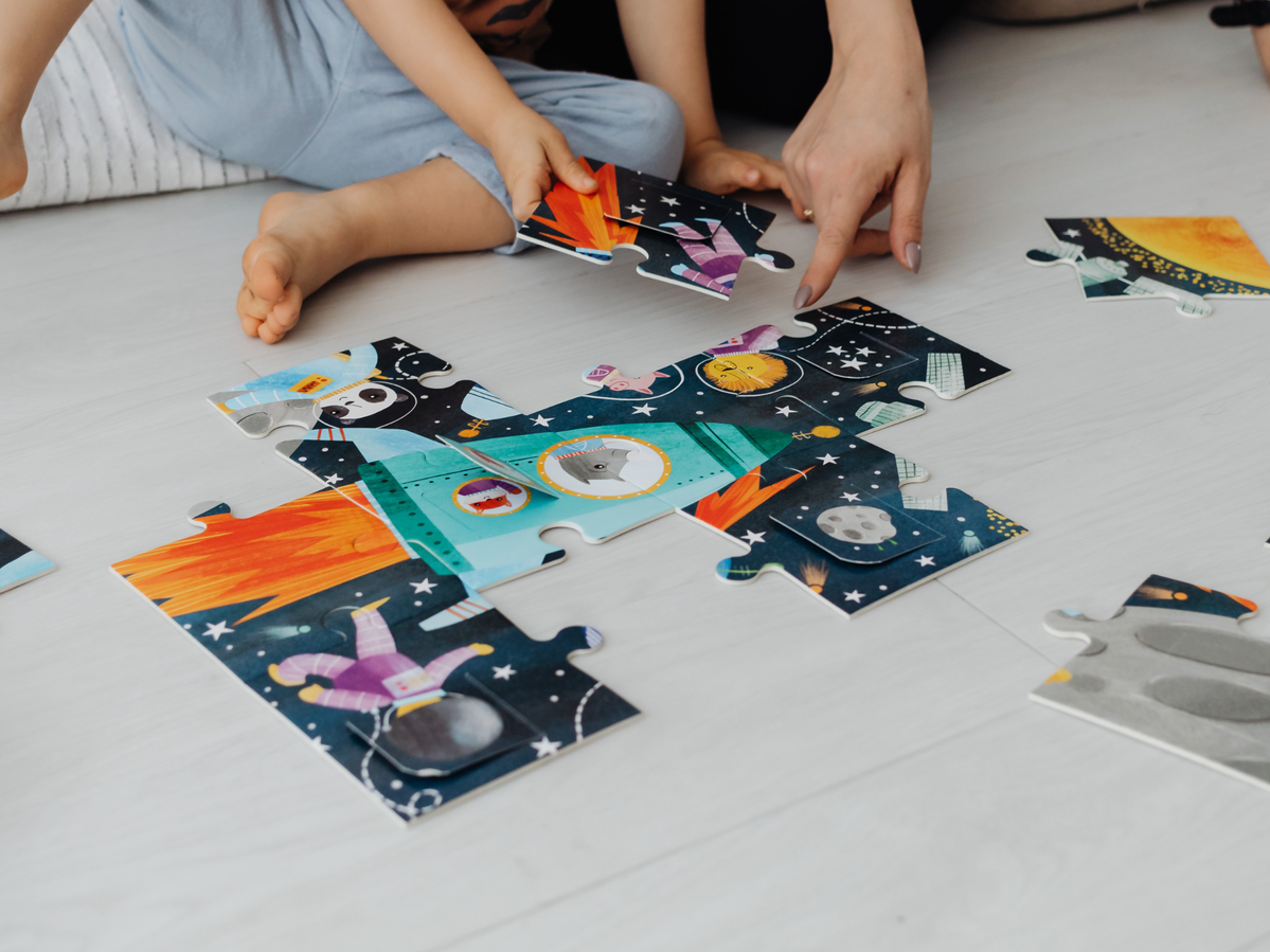 children playing a puzzle